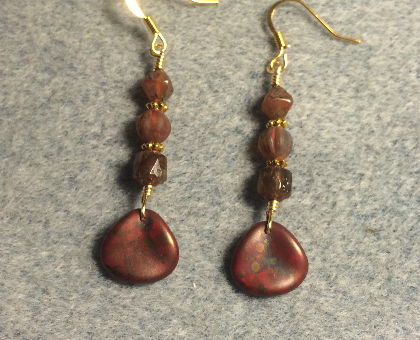 Opaque reddish brown Czech glass rose petal earrings adorned with reddish brown Czech glass beads.