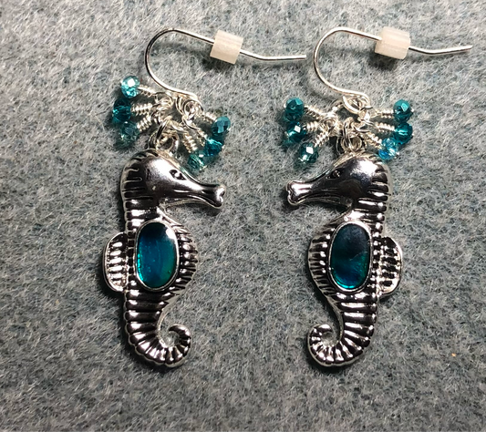 Silver and turquoise abalone seahorse charm earrings adorned with tiny dangling turquoise Chinese crystal beads.