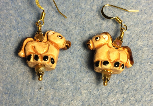 Small tan and brown ceramic horse bead earrings adorned with tan Chinese crystal beads.