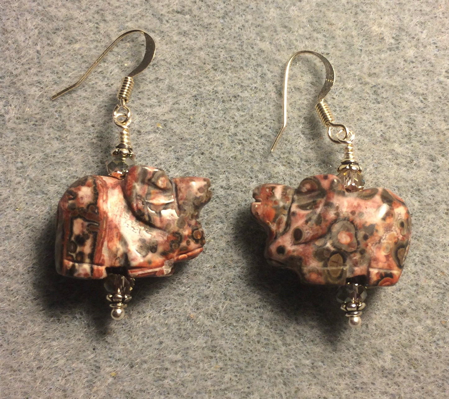 Pink leopard skin jasper gemstone elephant bead earrings adorned with pink Chinese crystal beads.