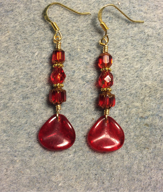 Translucent red Czech glass rose petal earrings adorned with red Czech glass beads.