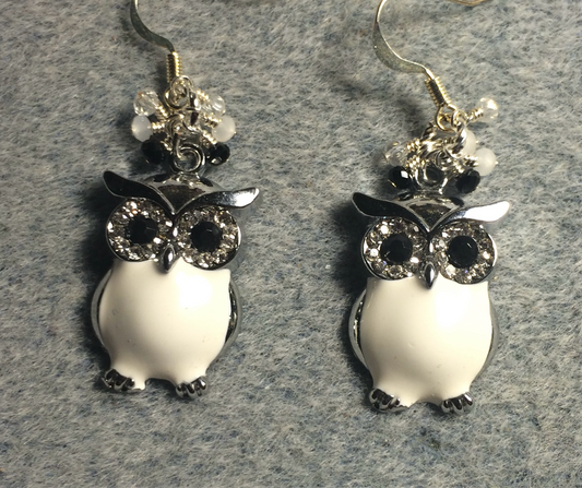 Large white and black enamel and rhinestone owl charm earrings adorned with tiny dangling white, black, and clear Chinese crystal beads.