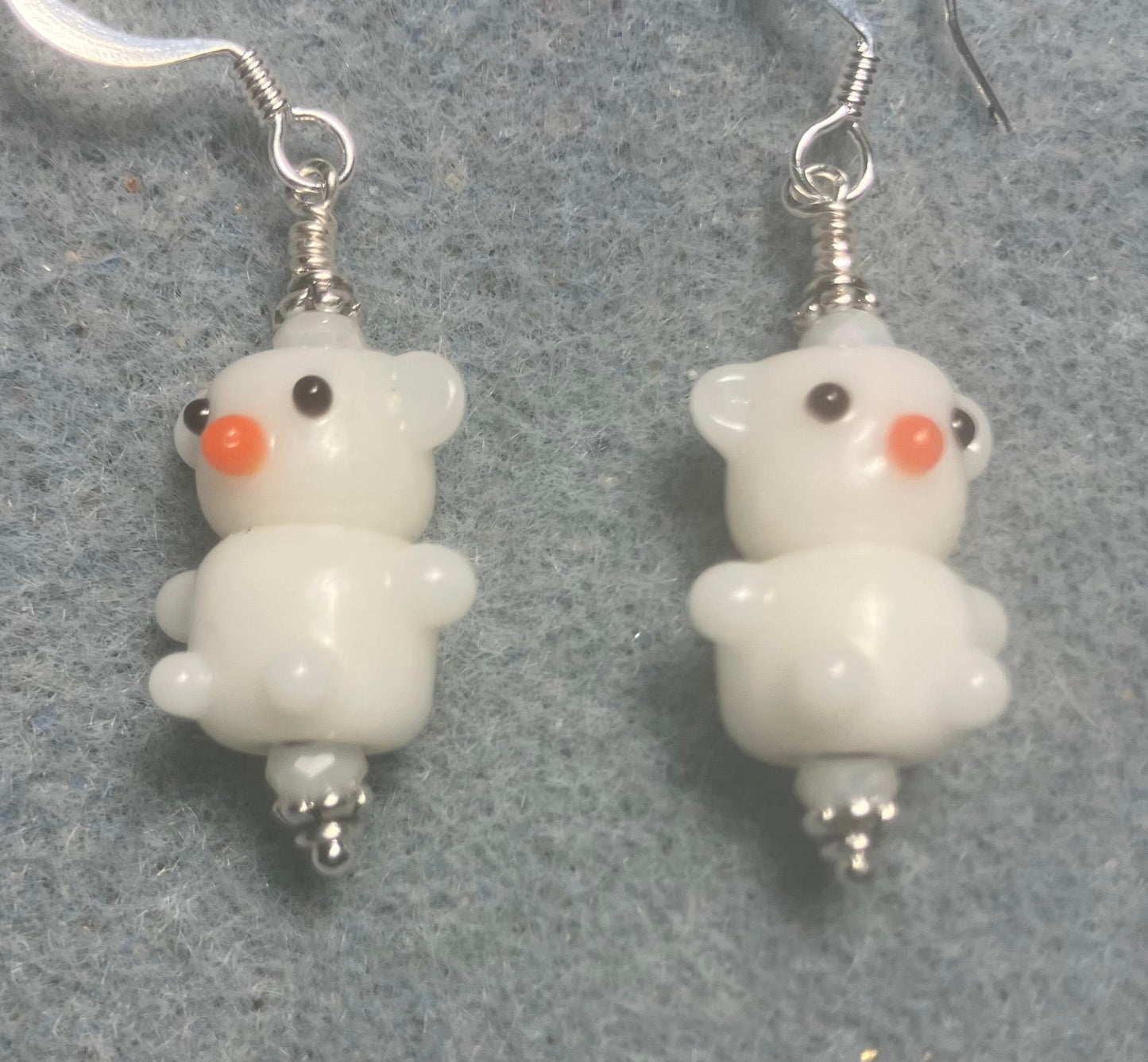 Small white lamp work teddy bear bead earrings adorned with white Chinese crystal beads.