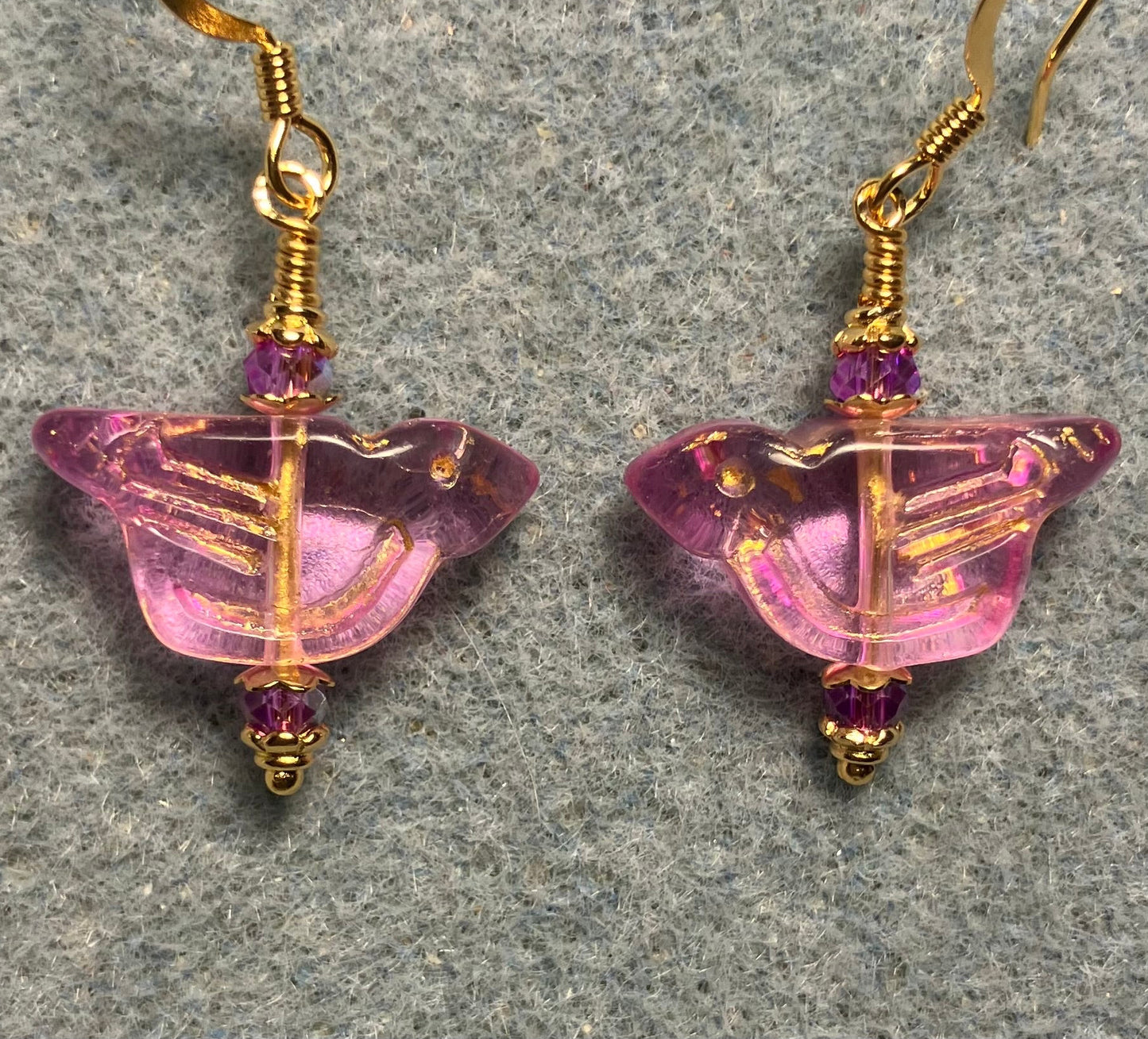 Translucent violet (with gold wash) Czech glass bird bead earrings adorned with violet Chinese crystal beads.