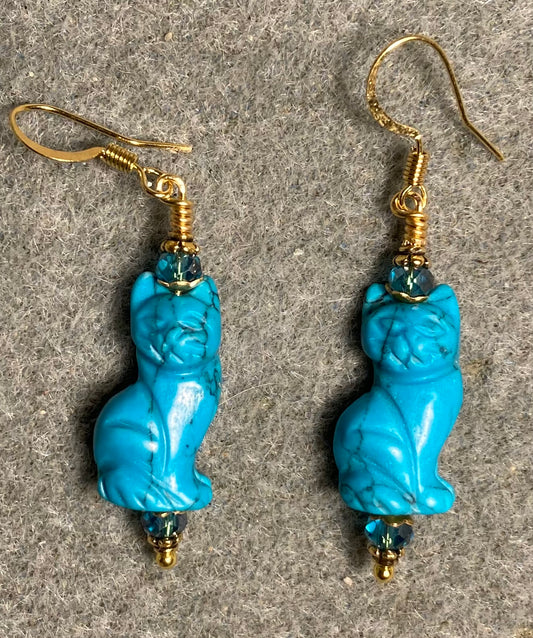 Turquoise howlite gemstone cat bead earrings adorned with turquoise Chinese crystal beads.