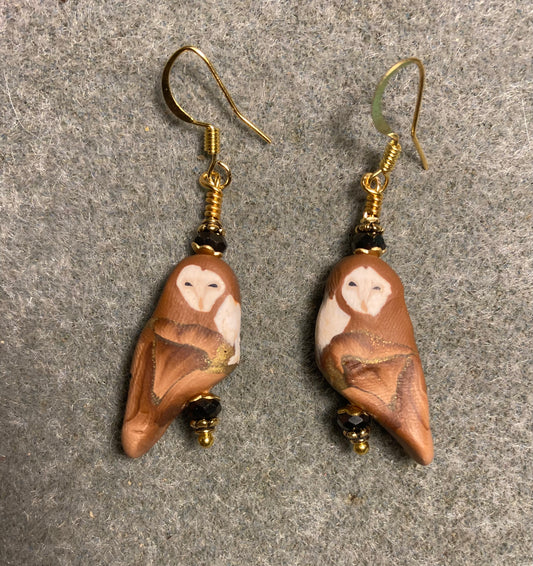 Brown and tan polymer clay owl bead earrings adorned with brown Chinese crystal beads.