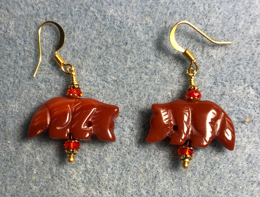 Carnelian gemstone wolf bead earrings with orange red Chinese crystal beads.