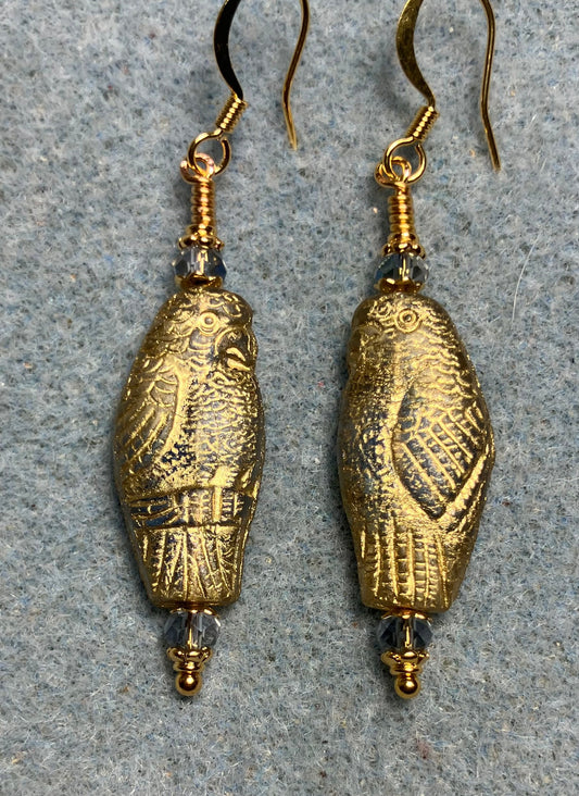 Large light blue (with gold wash) Czech glass parrot bead earrings adorned with light blue Chinese crystal beads.