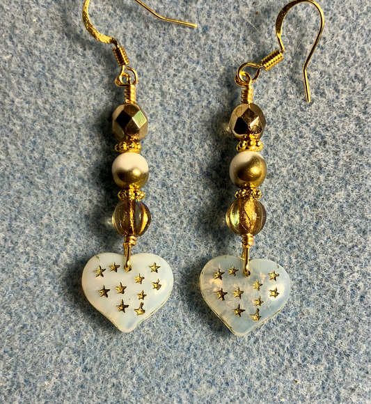 White and gold Czech glass heart bead earrings adorned with white and gold Czech glass beads.