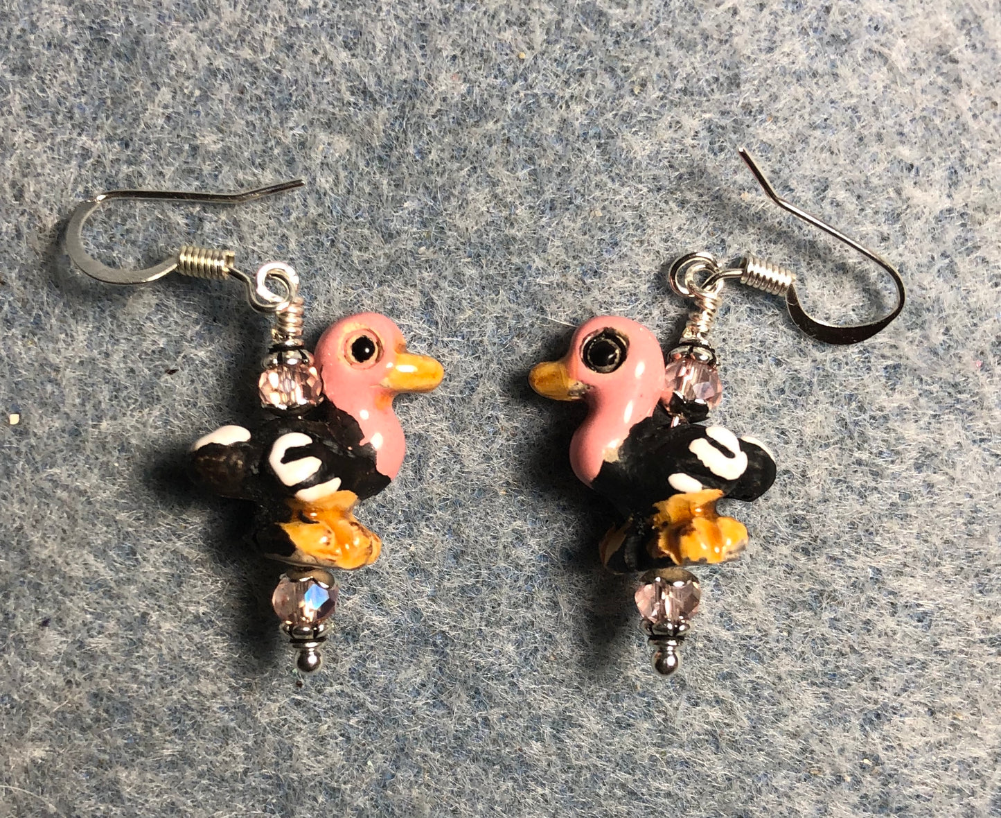 Small pink and black ceramic flamingo bead earrings adorned with pink Chinese crystal beads.