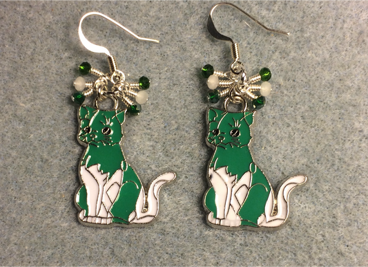 Green and white enamel cat charm earrings adorned with tiny dangling green and white Chinese crystal beads.