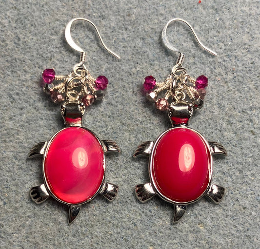Large silver and hot pink agate gemstone turtle charm earrings adorned with small dangling hot pink, pink, and silver Chinese crystal beads.
