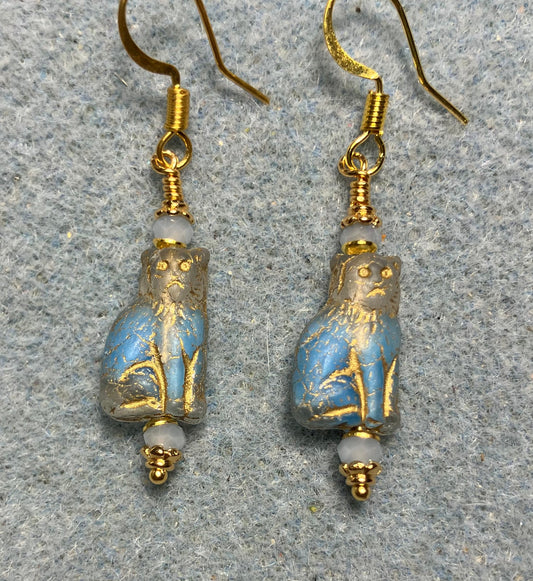 Small light blue and gold Czech glass cat bead earrings adorned with light blue Chinese crystal beads.