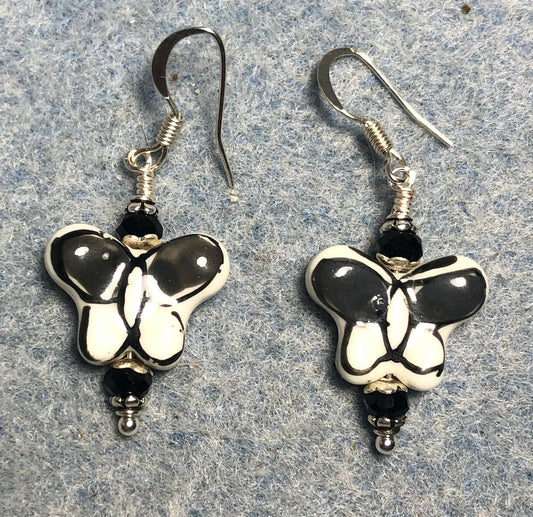 Black and white ceramic butterfly bead earrings adorned with black Chinese crystal beads.