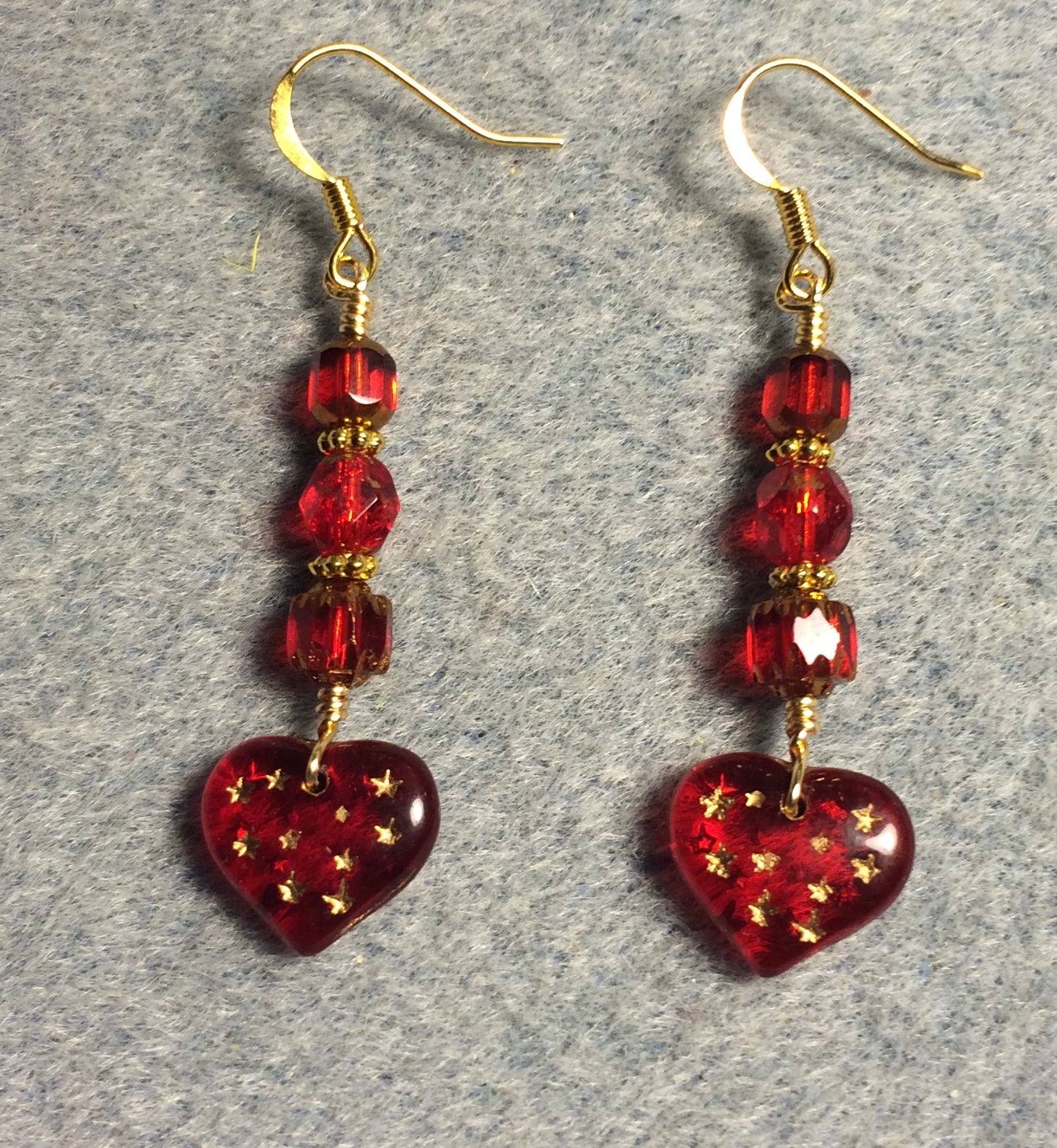 Bright red Czech glass heart bead earrings adorned with bright red Czech glass beads.