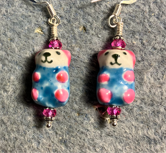 Blue and hot pink ceramic teddy bear bead earrings adorned with hot pink Chinese crystal beads.