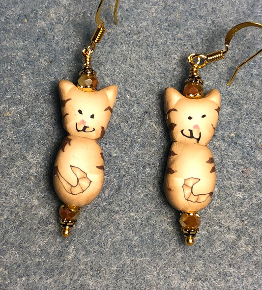 Tan polymer clay striped tabby cat bead earrings adorned with tan Chinese crystal beads.