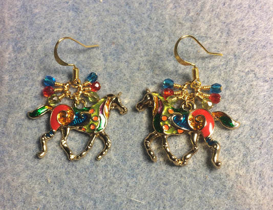 Red, turquoise, and green enamel horse charm earrings adorned with small dangling red, turquoise, and green Czech glass beads.