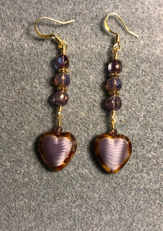 Purple and tan Czech glass heart bead earrings adorned with purple Czech glass beads.