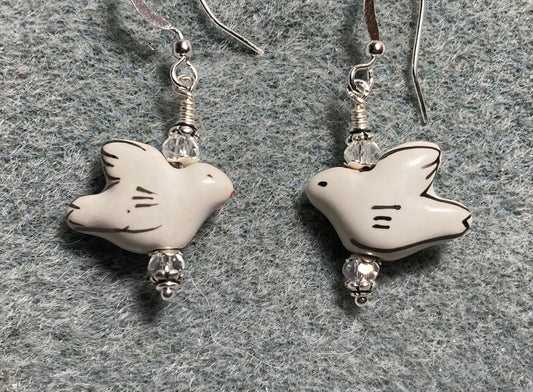 White ceramic dove bead earrings adorned with clear Chinese crystal beads.