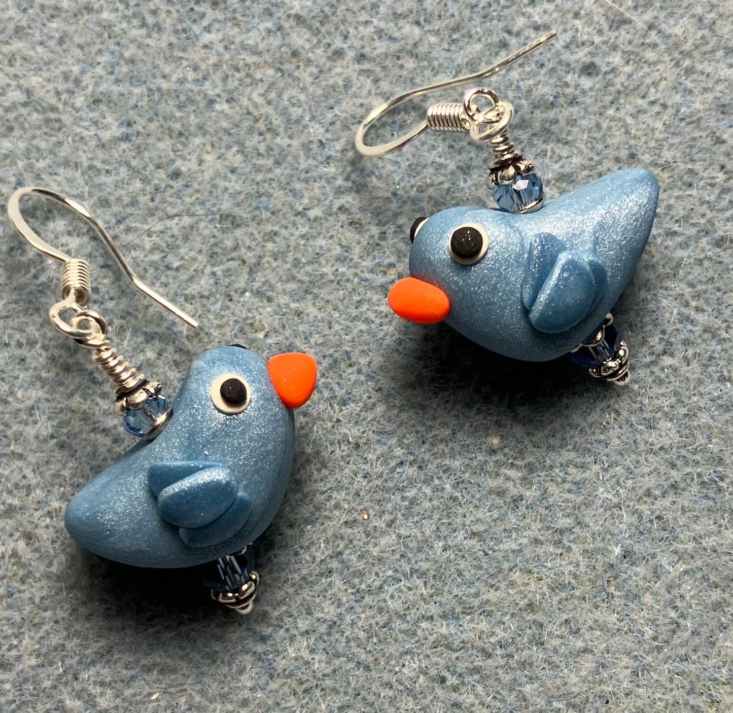 Small light blue polymer clay bird bead earrings adorned with light blue Chinese crystal beads.