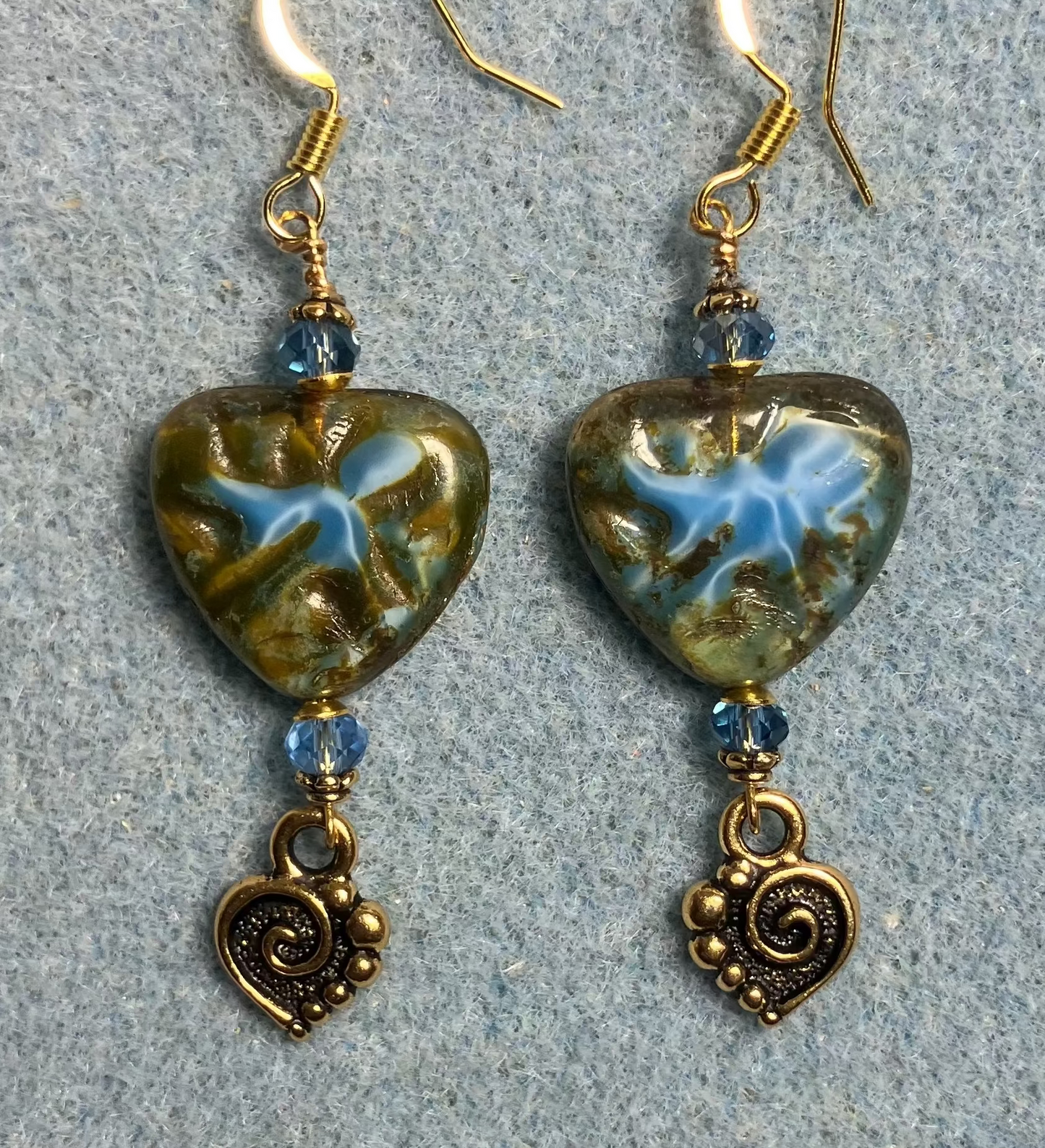 Blue Picasso Czech glass heart bead earrings made with light blue Chinese crystal beads and gold Tierracast spiral heart charms.